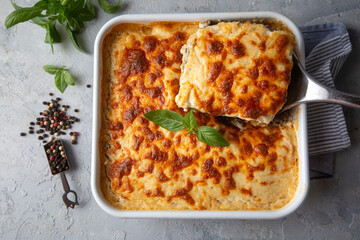 Traditional Greek potato and meat casserole with cheese - moussaka