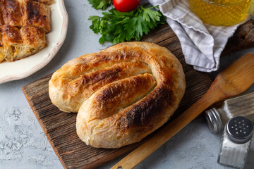Turkish style meat stuffed filo dough borek served kol boregi.