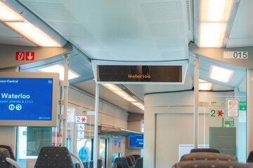 Inside the Belgian train announcing that it would arrive at Waterloo station near Brussels, Belgium.