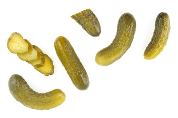 Delicious marinated pickled cucumbers and slices isolated on a white background, top view.