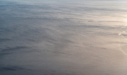Calm sea surface with soft light