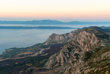 Mountain view over sea at sunset, aerial