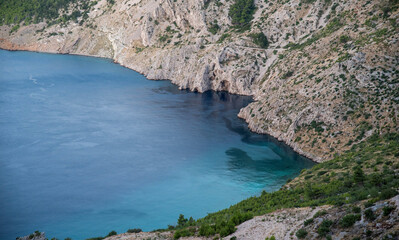 Rocky Adriatic cliffs with turquoise water