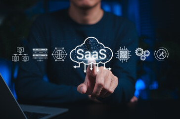 SaaS cloud computing and software service technology. Person interacts with SaaS cloud icons, represent Software as a Service, cloud infrastructure, data processing digital platform-based solutions