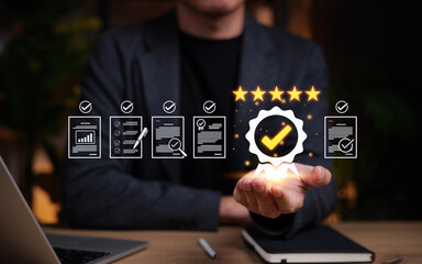 Quality assurance and compliance concept. Businessman holding a glowing badge with check mark and five stars. Surrounding document icons represent evaluation, audit, certification and process control.