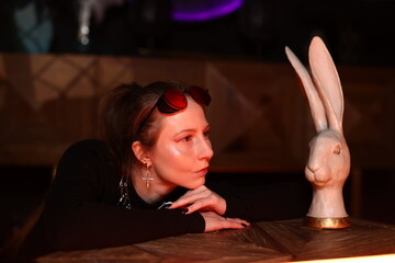 costume designer studying, rabbit sculpture in studio, studying rabbit head sculpture in studio © diczman