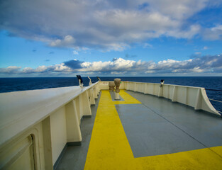 View of the bridge wings of a ship under dramatic sky