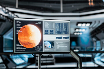Close up of monitor in spaceship displaying detailed planetary scan of Mars. Screen in futuristic spacecraft showing red planet surface data telemetry details during space mission