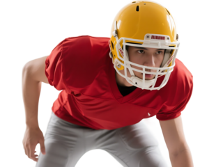 A football player in red uniform and yellow helmet is in a ready-to-play stance, showcasing athletic readiness.