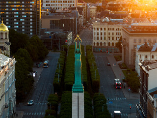 Birds eye view of the old city of Riga and statue of liberty - Milda.