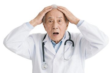 An elderly doctor in a white coat with a stethoscope looks very worried, holding his head.