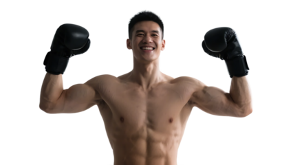 A confident muscular man in boxing gloves displays his well-defined physique, showcasing strength and fitness.