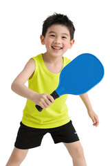 A young boy in a yellow top and black shorts is joyfully playing with a blue paddle, showcasing an active and cheerful demeanor.