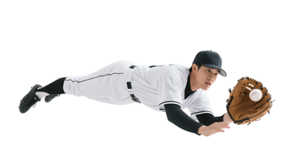 A baseball player in mid-air making a diving catch to secure the ball with his glove.