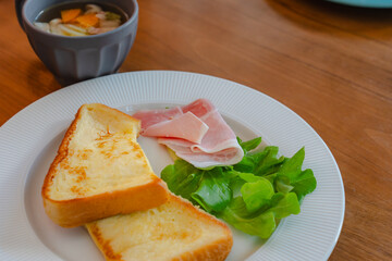 French toast breakfast with ham and soup
