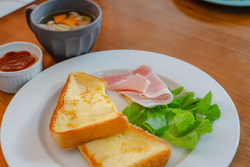 French toast breakfast with ham and soup
