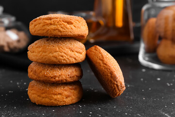 Delicious cookies on black background, closeup