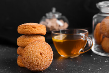 Tasty cookies on black background, closeup