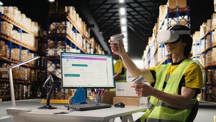 Worker in hi vis vest uses a VR headset connected to AI for hands free inventory control, parcel shipment tracking and order fulfillment. Virtual reality improves fast delivery. Camera A.