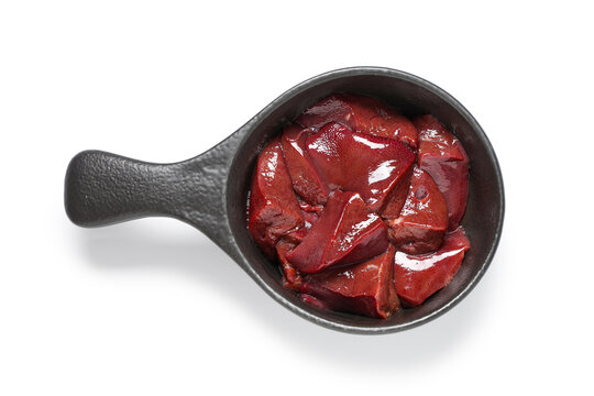 Baking dish with raw liver on white background