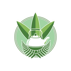 focus on main subject cooking kettle with leaves and natural theme.