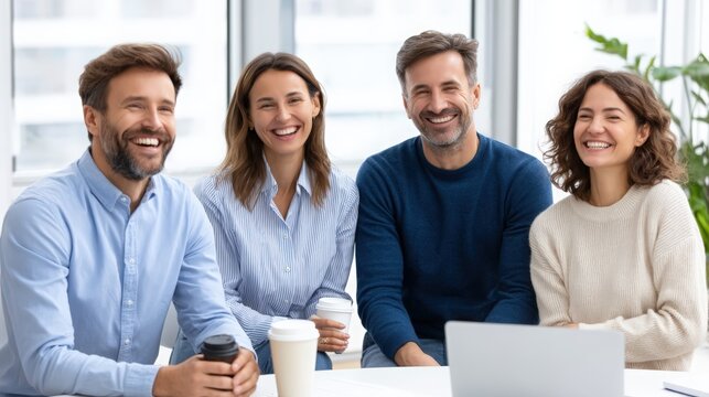 Happy Business Team Enjoying Coffee Break in Modern Office Space