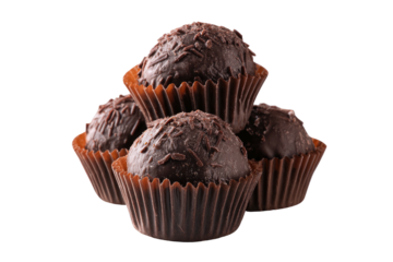 Chocolate truffles stacked in paper liners