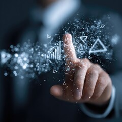 Close-up of a hand interacting with a holographic projection displaying upward trending graphs and geometric shapes, suggesting data analysis or technological advancement