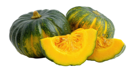 Two whole and sliced pumpkins, vibrant colors