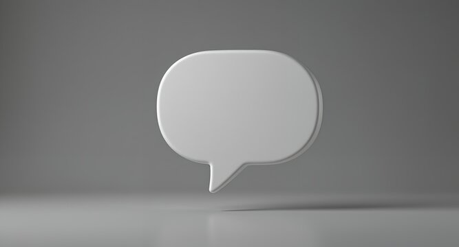 A clean, white speech bubble icon floating in a minimalist studio environment