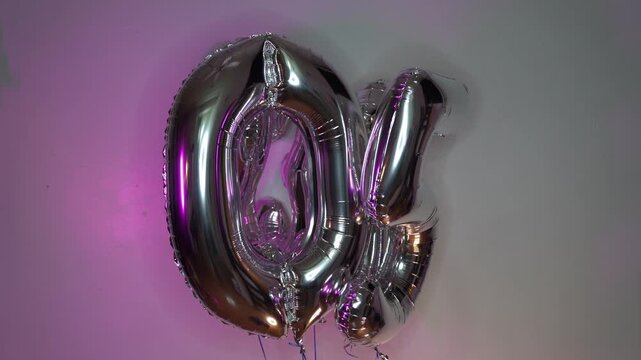 Jumble of silver inflatable letters