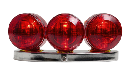 Three round red lights mounted on a metal bar
