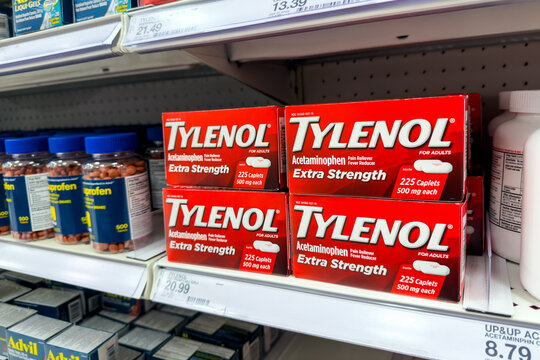 Small cartons boxes containing plastic bottles of TYLENOL  Extra Strength Pain Reliever Capsules for sale at a California local pharmacy store	