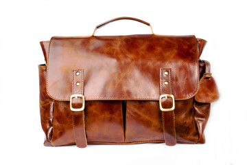Tan colored leather bag with vintage design, isolated on white background