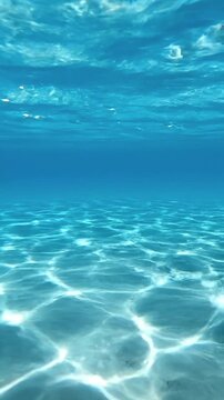 Rippling water caustics pattern, underwater light reflections dancing on surface.