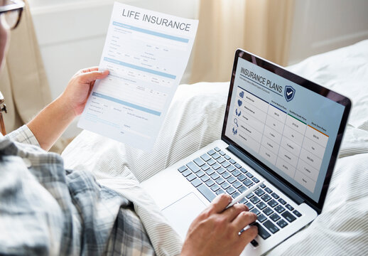 Man Working On laptop Mockup On Bed