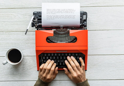 Aerial View Of A Man Typing On A Retro Typewriter Mockup