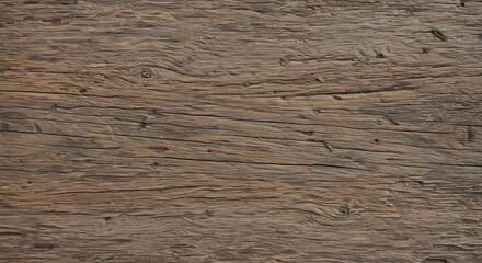 Weathered brown wooden planks with visible grain knots and cracks