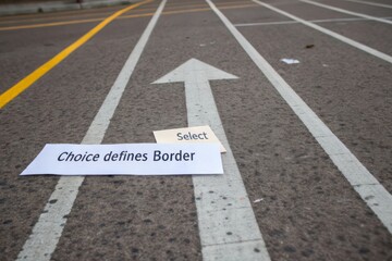 A white arrow on a track with text representing choice and borders