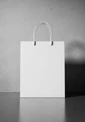 Empty white shopping bag isolated on white background