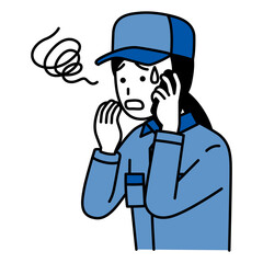 スマートフォンでの通話で困惑するつなぎ作業服の女性