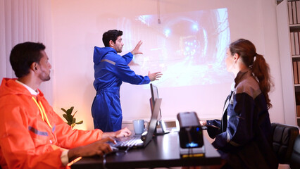 Engineers and industrial workers in safety uniforms discussing a tunnel construction