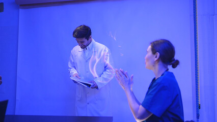 Doctors and medical professionals celebrate successful patient surgery