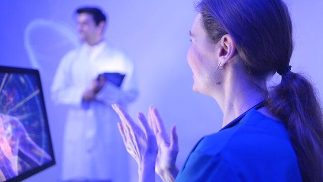 Doctors and medical professionals celebrate successful patient surgery