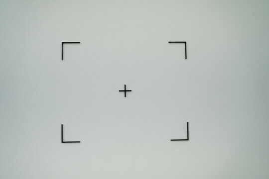 Fretwork or stencil to square perforated sheet or mark point or aim with white background
