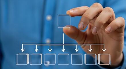 Hand holding a transparent cube above a row of connected transparent cubes forming an organizational chart structure
