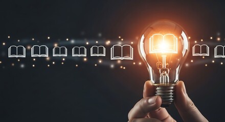 Hand holding glowing light bulb with open book icon symbolizing idea generation and knowledge acquisition