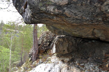 The unique nature of Lapland, moss- and lichen-covered rocks and cliffs of the polar tundra in early spring.