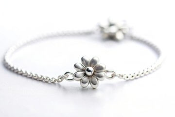 Elegant silver bracelet featuring delicate floral accents, perfect for adding a touch of sophistication to any ensemble.