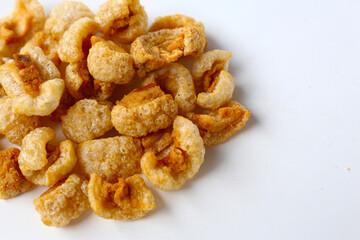 Crispy pork cracklings, a crunchy savory snack.